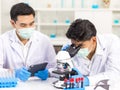 Health care researchers working in biological science laboratories. Royalty Free Stock Photo