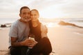 Health care, sport and love. Happy senior caucasian lady and man in sportswear hugs with bottle of water Royalty Free Stock Photo