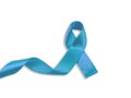 Health care and symbolics concept. Close up of blue prostate cancer awareness ribbon