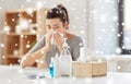 Medicines and sick woman blowing nose to wipe Royalty Free Stock Photo