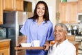 Health Care Worker and Elderly Man