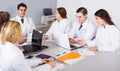 Health-care workers and head physician at colloquium in clinic Royalty Free Stock Photo