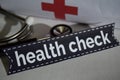 Health check message with stethoscope, health care concept. Royalty Free Stock Photo