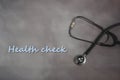 Health check text stethoscope, health and medical