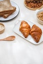 Health and colorful breakfast - waffles, muffins, almond, hazelnuts, various fresh fruits on table. Health food concept .Top view