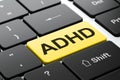 Health concept: ADHD on computer keyboard background