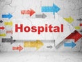 Health concept: arrow with Hospital on grunge wall background