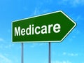 Health concept: Medicare on road sign background Royalty Free Stock Photo