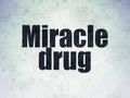 Health concept: Miracle Drug on Digital Data Paper background