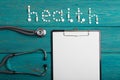 Health concept - pills, stethoscope, clipboard Royalty Free Stock Photo