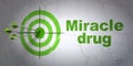 Health concept: target and Miracle Drug on wall background Royalty Free Stock Photo