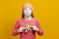 Healthy Eating Concepts. Thinking Caucasian Girl In Coral Knitted Clothing Posing With Cauliflower as a Demonstration of Human Royalty Free Stock Photo