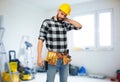 Male worker or builder with neck pain