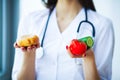 Health. Diet and Healthy. Doctor Dietitian Holding Fresh Tomatoes In Her Hands And Smiles. Beautiful and Young Doctor. High