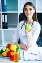 Health. Diet and Healthy Nutrition. Doctor Dietitian Holding in