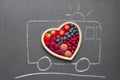 Health diet heart abstract concept with rescue ambulance on blackboard