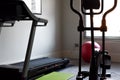 Health and fitness gym equipment in a home gym interior