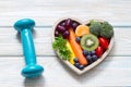 Health food in the heart and sport diet nutrition concept