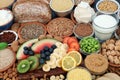 Health food for vegans with almond butter, yoghurt & milk, tofu bean curd, grains, seeds, nuts, fruit, vegetables, cereals, sos