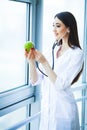 Health. Healthy Diet. Doctor Dietitian Holding in Hands Fresh Gr Royalty Free Stock Photo