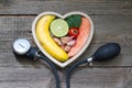 Health heart diet food concept with blood pressure gauge Royalty Free Stock Photo