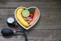 Health heart diet food concept with blood pressure gauge Royalty Free Stock Photo