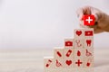 Arranging wood block stacking with icon healthcare medical, Insurance for your health concept