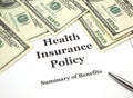 Health Insurance Policy and Cash Royalty Free Stock Photo