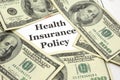 Health Insurance Policy costs cash Royalty Free Stock Photo