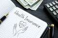 Health insurance is shown on the business photo using the text