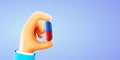 Health and medicine concept - closeup of doctor hand holding pill in a capsule. Drugs or vitamin. Royalty Free Stock Photo