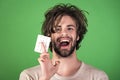 Health and medicine, hangover. Happy Man with pills in blister pack. Dieting pill and vitamin, man with anabolic. Royalty Free Stock Photo