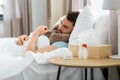 sick man sleeping in bed at home Royalty Free Stock Photo