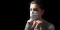 Sick woman adjusting protective medical face mask