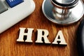 Health Reimbursement Account HRA letters on desk