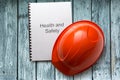 Health and safety register with helmet Royalty Free Stock Photo