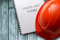 Health and safety register with helmet Royalty Free Stock Photo