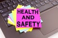 Health and Safety writing text made in the office close-up on laptop computer keyboard. Business concept for Awareness Standard co