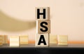 Health Savings Account HSA letters from wooden blocks Royalty Free Stock Photo