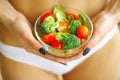 Health. Slim Girl Holding In Hands Fresh Salad. Young Girl in White Underwear. Healthy Eating. Diet. High Resolution Royalty Free Stock Photo