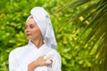 Health, spa and beauty concept - beautiful woman in towel Royalty Free Stock Photo