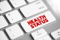 Health Status - individual`s relative level of wellness and illness, text concept button on keyboard Royalty Free Stock Photo