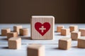 Health symbol wooden block amidst scattered blocks on white surface, signifies medical care importance