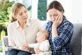 Health Visitor With New Mother Suffering With Depression