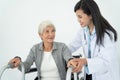 Health visitor and a senior woman during home visit Royalty Free Stock Photo