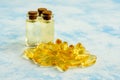 Health, vitamins and natural medicines - omega 3 capsules on a blue background.