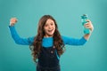 Health and water balance. Girl hold water bottle. Kid girl long hair has water bottle. Water balance concept. Drink some