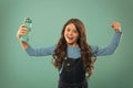 Health and water balance. Girl hold water bottle. Kid girl long hair has water bottle. Water balance concept. Drink some