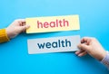 Health and wealth concepts with taxt on bubble speech