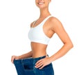 Health, weight loss and diet, woman with jeans and tummy tuck with skinny waist, cropped and  on white Royalty Free Stock Photo